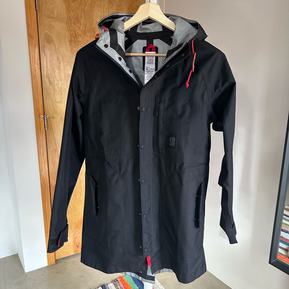 Topo Designs Black Raincoat with Red Accents